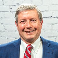 Gene Raymond headshot